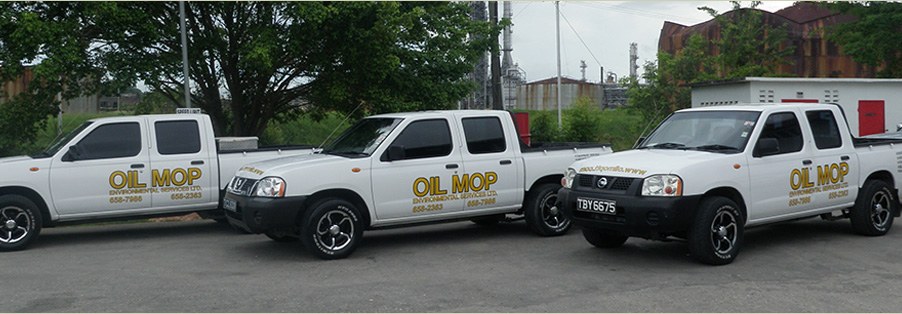Oil Mop Environmental Services support vehicles at a petrochemical plant
