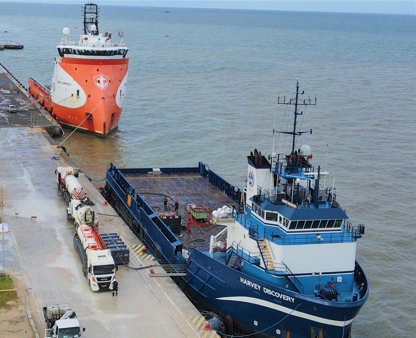 Oil Mop trucks supporting marine waste operations at a Trinidad port